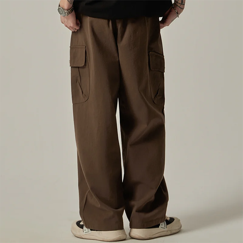 Pantalones cargo para hombre (primavera/otoño 2025): estilo vintage japonés, corte recto y holgado de pernera ancha, con botones, bolsillos grandes y cintura con cordón.
