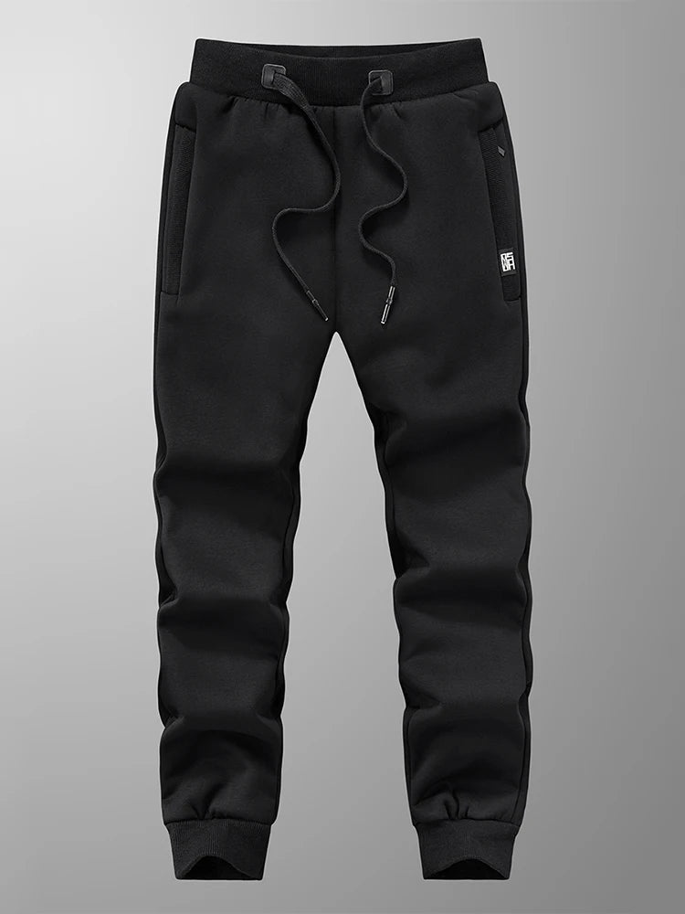 Pantalones de chándal para hombre de invierno: joggers gruesos y cálidos de felpa, ropa deportiva casual de algodón con bolsillos con cremallera y tallas grandes (6XL, 7XL, 8XL).