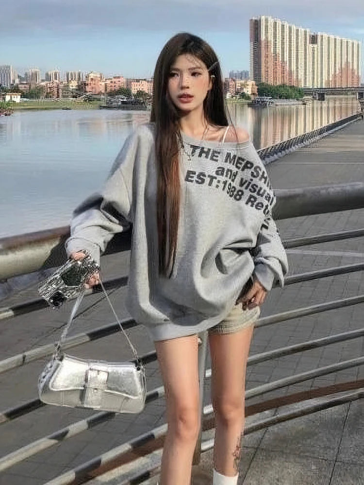 Sudadera estilo Y2K para mujer: oversize, estilo urbano, manga larga, un solo hombro, estampado TXT, moda coreana, ideal para otoño e invierno.