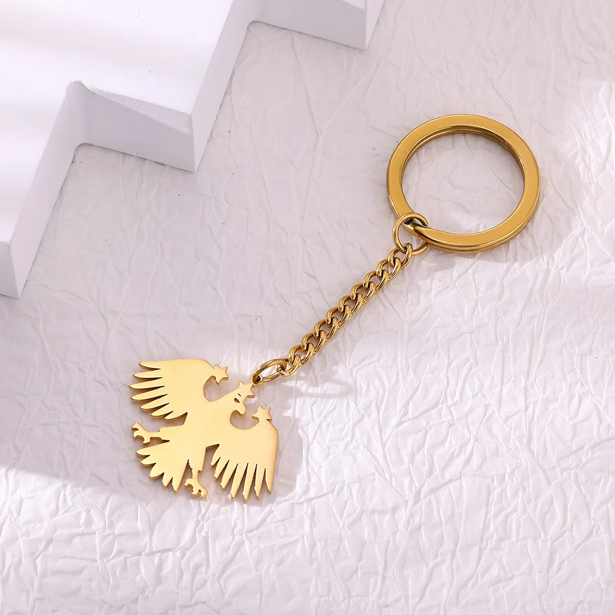 Llavero Águila & Estrellas en Acero Inoxidable Dorado – Accesorio Elegante para Mujer
