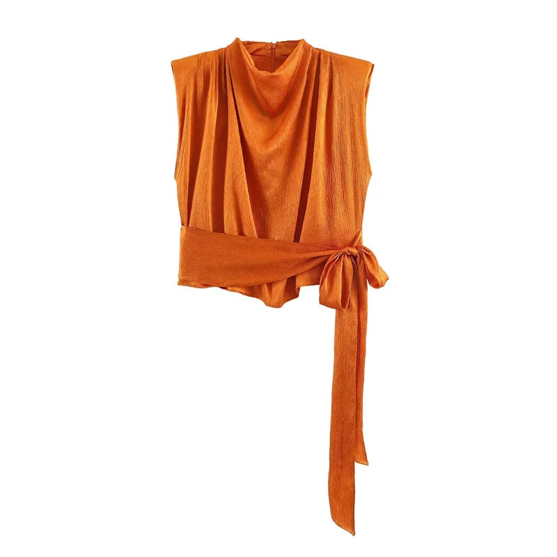 Top para mujer, novedad de primavera 2026: diseño naranja sin mangas con textura satinada y lazo largo; una prenda elegante, estilosa y única que marca tendencia.