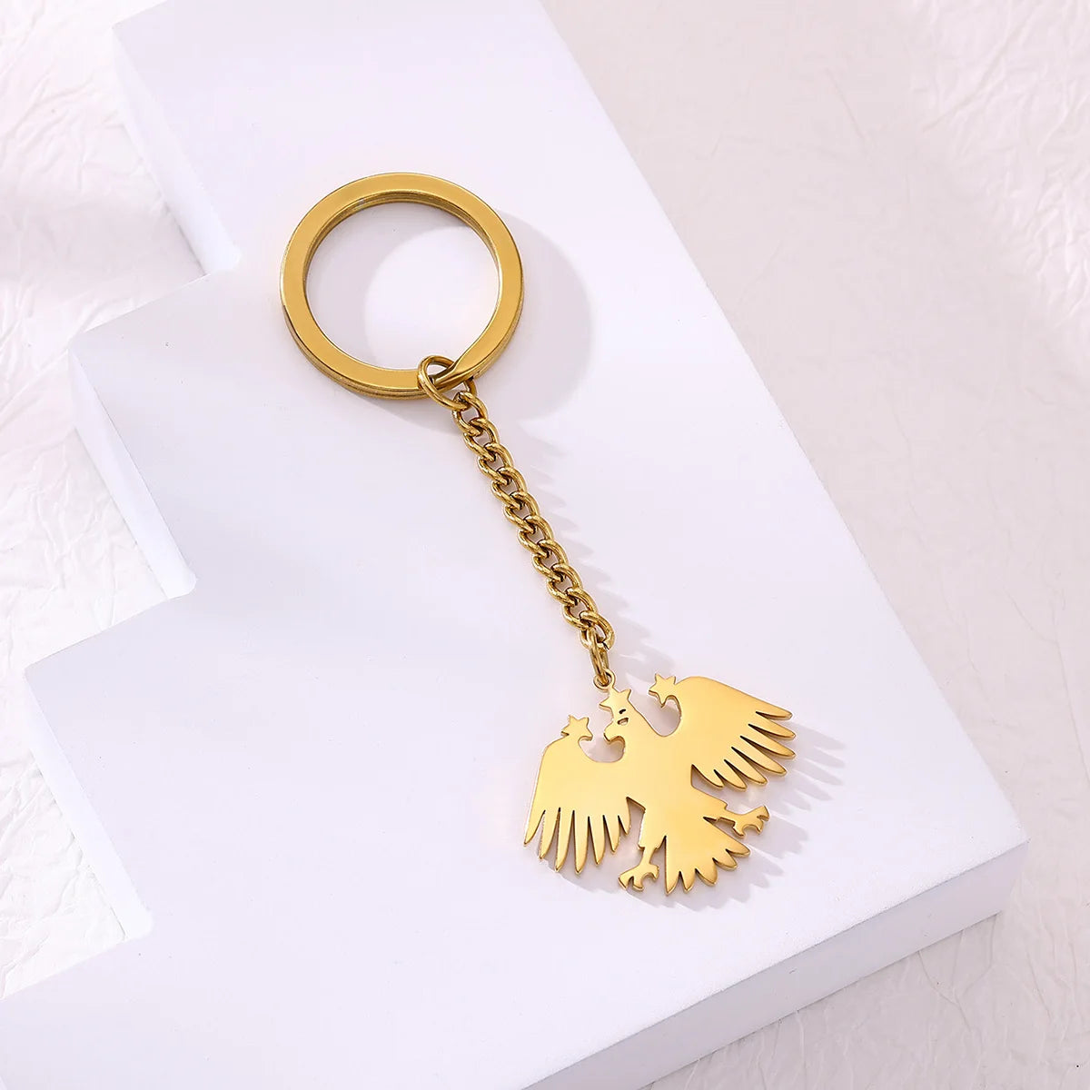 Llavero Águila & Estrellas en Acero Inoxidable Dorado – Accesorio Elegante para Mujer