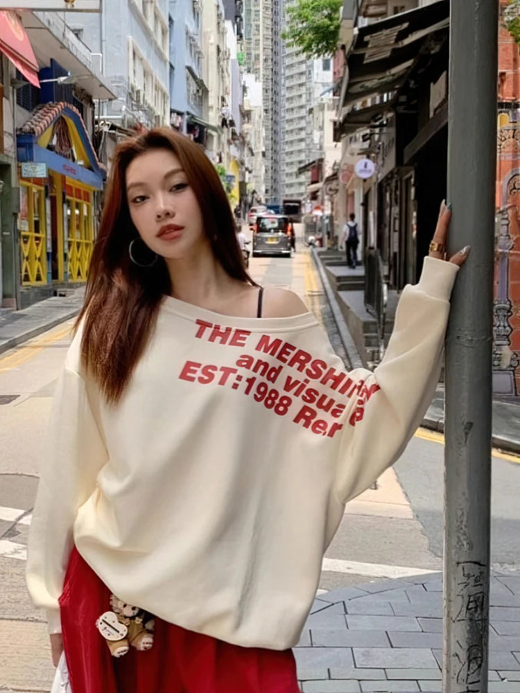 Sudadera estilo Y2K para mujer: oversize, estilo urbano, manga larga, un solo hombro, estampado TXT, moda coreana, ideal para otoño e invierno.