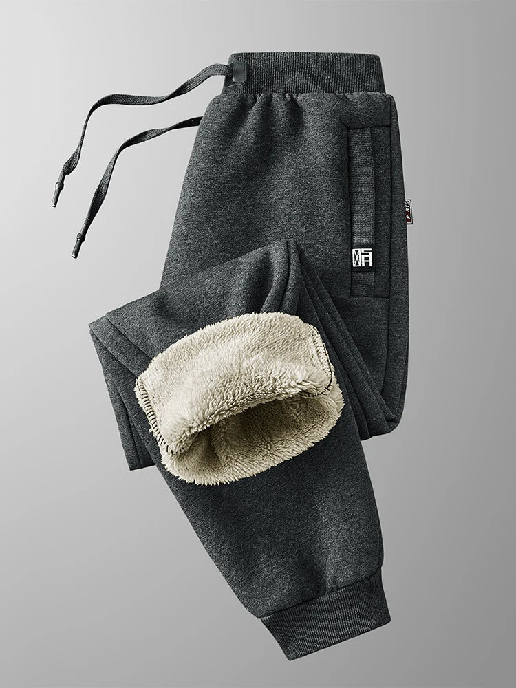 Pantalones de chándal para hombre de invierno: joggers gruesos y cálidos de felpa, ropa deportiva casual de algodón con bolsillos con cremallera y tallas grandes (6XL, 7XL, 8XL).