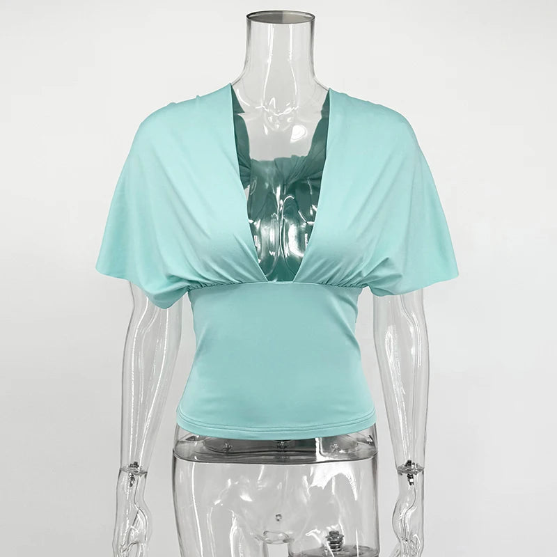 Top corto sexy de tirantes con cuello en V para mujer; estilo Y2K ajustado, sin espalda, con cordones y detalle fruncido. Ideal para fiestas y discotecas. Tendencia verano 2026.