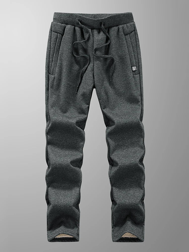 Pantalones de chándal para hombre de invierno: joggers gruesos y cálidos de felpa, ropa deportiva casual de algodón con bolsillos con cremallera y tallas grandes (6XL, 7XL, 8XL).