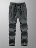 Pantalones de chándal para hombre de invierno: joggers gruesos y cálidos de felpa, ropa deportiva casual de algodón con bolsillos con cremallera y tallas grandes (6XL, 7XL, 8XL).