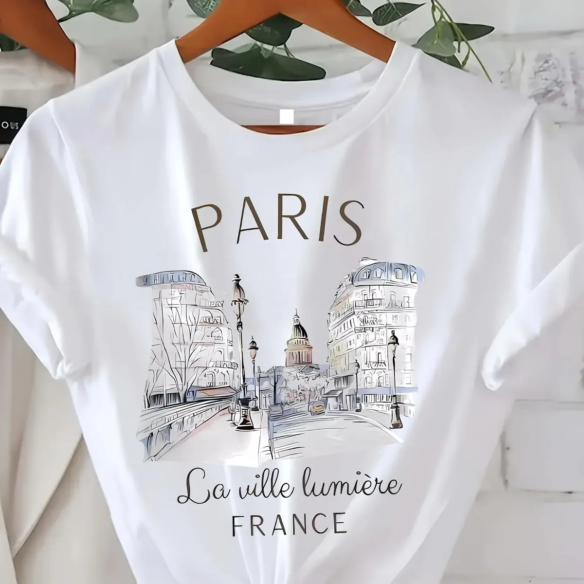 Camiseta estilo años 90 con estampado de París para mujer y chica; manga corta, cuello redondo, prenda casual ideal para primavera y verano.